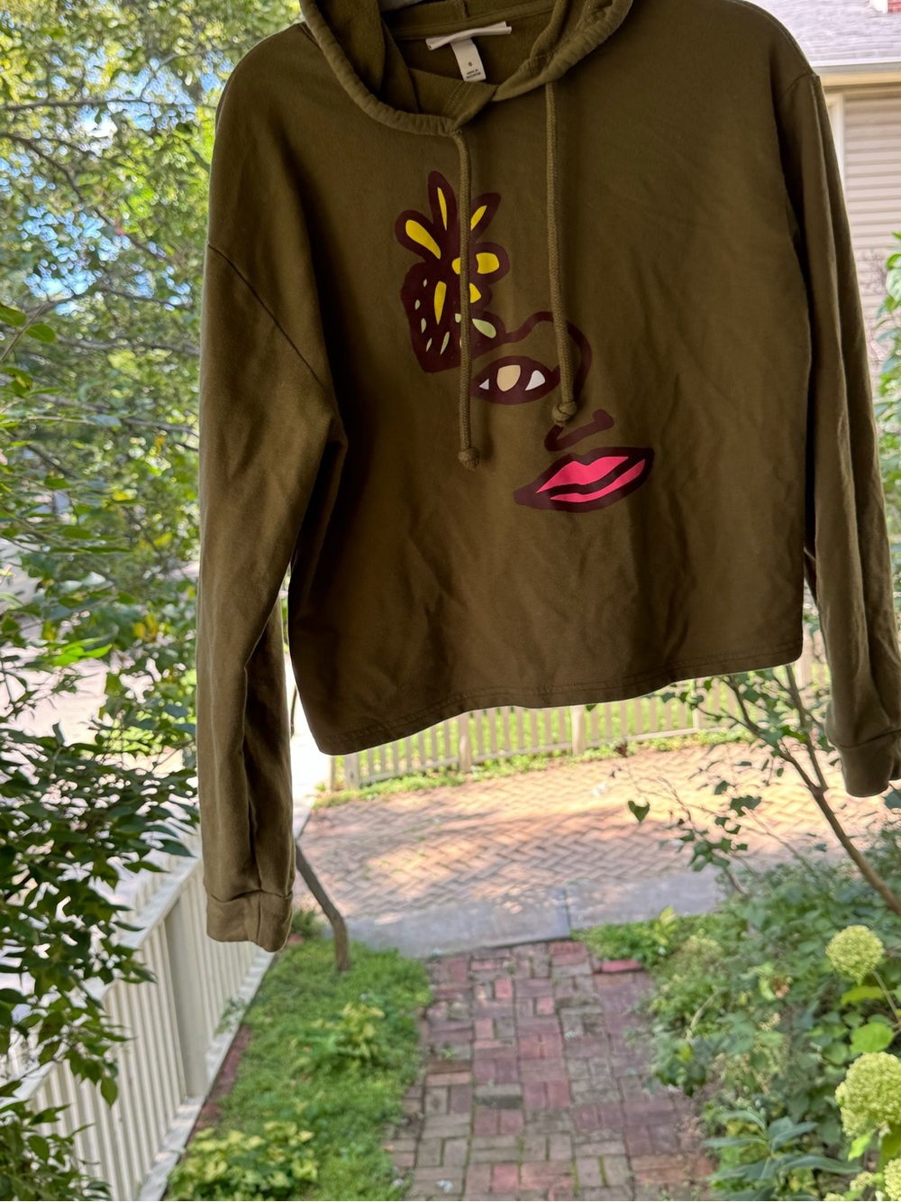 Olive Cropped Hoodie with Abstract Face Motif